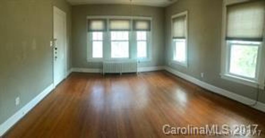 Absolutely charming 1 bedroom, 1 bathroom apartment in the heart of Dilworth. Spacious and bright living room with incredible views of city living. Hardwood floors, neutral tones and original characteristics adorn the interior of the unit. Galley kitchen complete with large storage closet in between. Two entrances at the front and back of the apartment provide ease of living. 1 car carport spot! Shared washer/dryer located in basement!