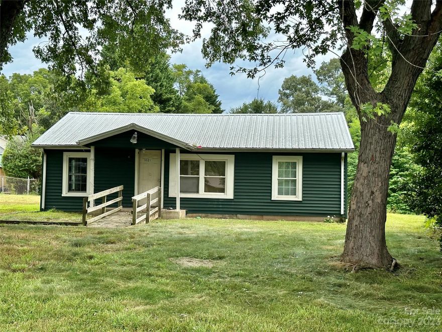 Get out your tools and transform this home back to it’s glory! 2 BR / 1 Bath Cottage on half acre lot. Convenient location near I-40, shopping, restaurants, and schools. No city taxes! Square footage is due to ceiling heights. Recent septic inspection failed.