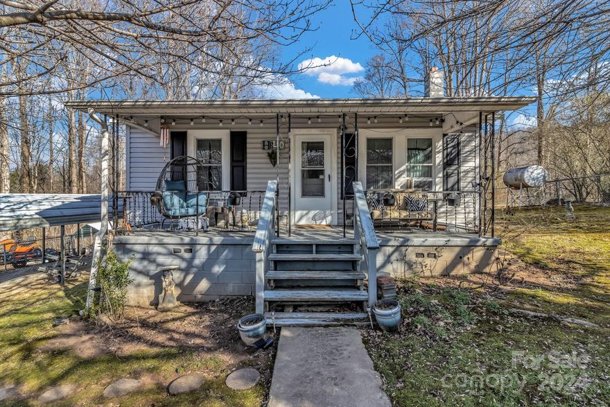 Just listed! This adorable home is located within minutes to downtown Marion with it's shops, restaurants, and entertainment. Step inside and you will find original hardwood floors, a large living room with tons of natural light, and a kitchen with ample cabinet and counter space. The primary bedroom features an ensuite bath with updated shower. There is also two additional rooms. The covered side patio offers plenty of space for entertaining and there is a one car carport. The large fenced in yard is perfect for kids play, pets, or that garden you've been wanting. It is also within 15 minutes of picturesque Lake James and close to I-40 for those commuting. Call to schedule a showing today.