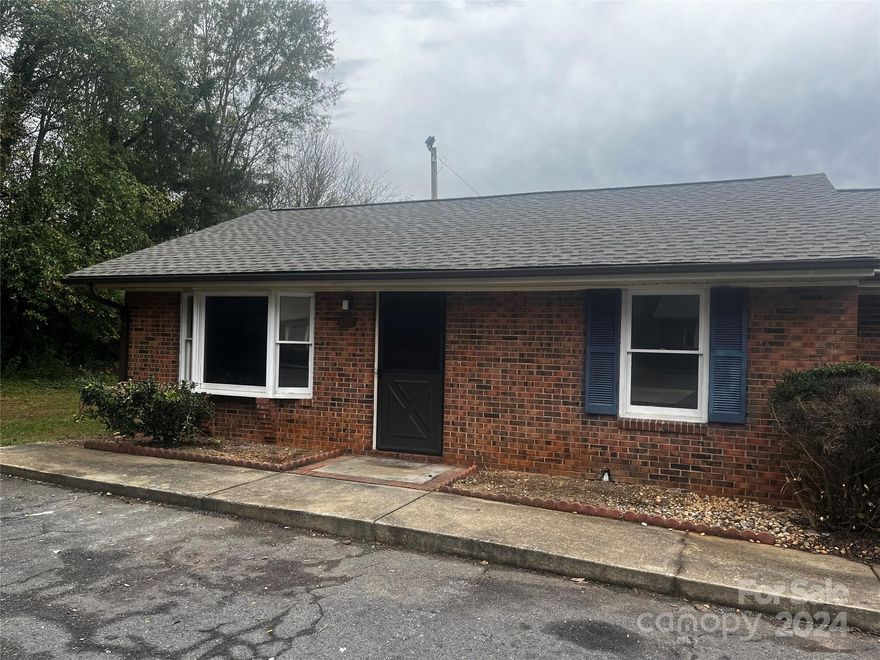 This two bedroom, one bath condo is an end unit with a new roof.  Spacious back deck for outdoor enjoyment. Great for a primary residence or to be used for an investment property.  Close to downtown Rock Hill, shopping, and dining.