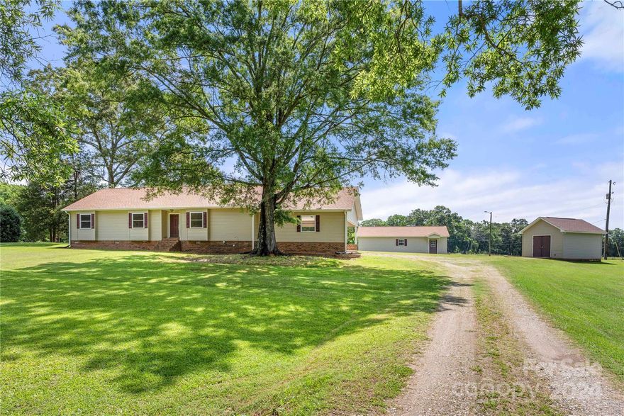 This is the one you have been waiting for! A darling ranch home on 4.3 acres with a detached 900+ square foot wood workers dream shop! Step inside this freshly painted ranch home in one of the prettiest parts of York. We love the grand living room, waiting for a cozy winter fire. All appliances are brand new in the open and large bright white kitchen. 3 spacious bedrooms and an office make this the perfect size for anyone looking to downsize. The wood working shop is truly amazing. Heated and cooled you are ready to go with full power as well. 960 square feet to do whatever you like! Enjoy the freedom to use your property how you like with NO HOA!