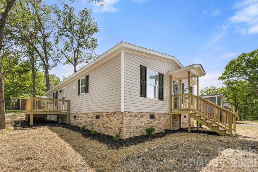 Welcome home to 1109 Marion! Open floorplan features a huge living area open to dining area and kitchen offering an island, walk in pantry, plenty of work and storage space, stainless steel appliances. Primary bedroom offers an en-suite with dual vanities and glass shower. Two more bedrooms share full bathroom with tub. Back deck for entertaining. LVP, accent lighting, laundry/drop zone off back deck. This is the one you have been searching for! *  List agents are Manufactured Home Dealers at Your Home Place LLC