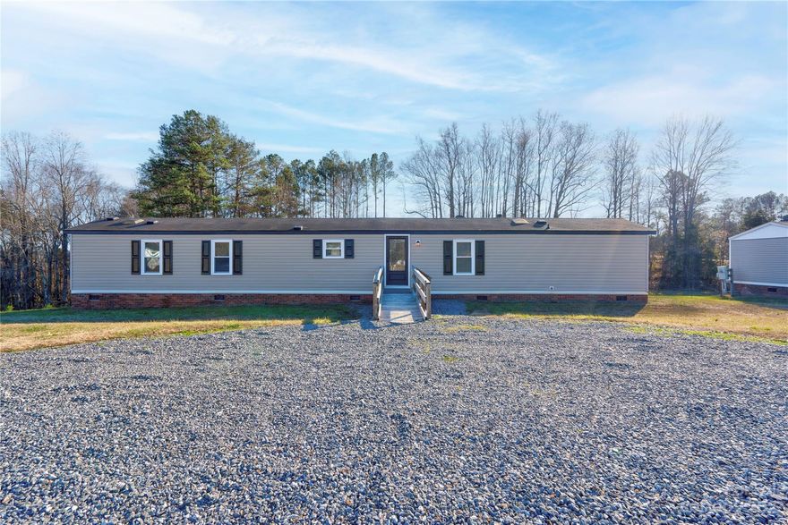 Beautiful updated & renovated 2 br 2 bath home on approx .556 acre lot in Deer Meadow s/d in Fallston area of Upper Cleveland County. Home has new luxury vinyl flooring thoughout. Freshly painted throughout with neutral colors. New kitchen, new windows, new lighting. HVAC was new in 2015. Subdivision has underground utilities. Home has vaulted ceilings. Living Room and Kitchen are spacious. Primary Bedroom has a walk-in closet which is also accessible from the Primary Bath. The primary bath has a soaking tub & a walk-in shower. Bedroom 2 has 2 closets. The home has a ramp on the front for ease of access. Being sold cash only.