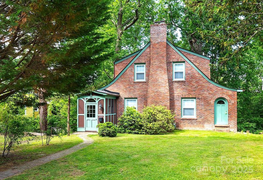 Massive price reduction ($150,000) on this truly unique historic gem in coveted Montford—one of Asheville’s most cherished neighborhoods. Nestled on peaceful Tacoma Circle beneath mature trees, this thoughtfully remodeled home blends timeless charm with modern comfort. Original plaster walls, arched doorways, and vintage hardware pair with updates like a newer roof and windows. The cozy living room with wood stove flows into a vaulted sunroom with stamped concrete floors. Enjoy a stylish renovated kitchen with granite, tile backsplash, and custom island, plus a sunny breakfast nook. Upstairs: a spacious bedroom with four closets and sitting nook, plus two bedrooms that get great light. Relax on the back deck overlooking a large yard. Street frontage on both Tacoma Circle and Westover Alley, there's off-street parking and access to a garage for a small car/motorcycle, plus potential for a secondary dwelling. Just a stroll to Montford Park, local eateries, and downtown Asheville—historic living meets modern lifestyle! House Sold As-Is.  Water leak in the kitchen going to basement. See agent remarks in MLS for other damage.