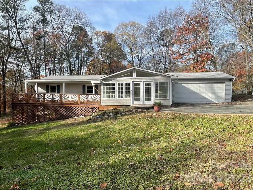 Charming two story single-family home located in the Riverview Acres subdivision (No HOA) just off I-485.  A large, welcoming sun room attached to a long & spacious front porch lead into the newly refurnished, open floor plan on the main floor.  A large family room adjoins the kitchen leading to a sitting/TV room.  Three well maintained bedrooms upstairs with a full bath.

Downstairs you will find a newly updated basement/living area.  The washer & dryer along with a sizeable bedroom, closet & full bath.  The basement also has it's own entrance leading into what could be a separate, secluded second living area.

Property is a single family residential ranch and NOT a manufactured DW (listing agent has paperwork)