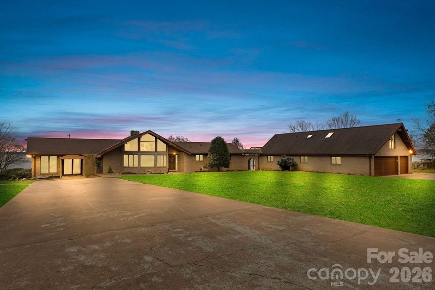 Welcome to this stunning, lakefront property on Lake Norman, offering breathtaking, unobstructed open water views! Situated on nearly an acre (.78 acres) at the end of a private road, this one-family-owned home, built in 1978, provides ultimate privacy and a peaceful retreat. Move-in ready or build your own dream home in this prime location. Enjoy the benefits of no HOA and no city taxes, making this property even more unique.
The property features a double boathouse, stationary dock, and an attached double-deck floating dock all permitted by Duke Power. With serene surroundings and endless possibilities, this unique property is truly a one of a kind!