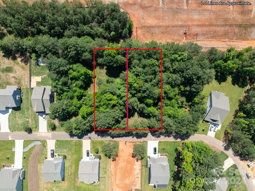 This extra large undeveloped lot gives you the freedom to create your own privacy or clear it for extra space within walking distance to the lake.