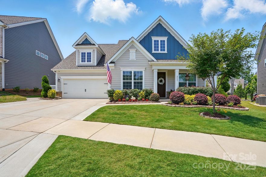 Welcome to this stunning home in the desirable community of Massey. Designed for elegance, and everyday living, this beautiful 4-bedroom home offers a thoughtfully designed floor plan perfect for modern lifestyle. The spacious primary suite on the main level features a luxurious walk-in shower. Two additional bedrooms on the main and private office level provide ideal accommodations for all. Upstairs, you'll find a private guest suite and a flexible bonus room. The heart of the home is the gourmet kitchen, quartz countertops, gas cook-top, and an oversized island that flows into the open-concept dining and living areas. Wide-plank flooring throughout the main floor. Step outside to the outdoor retreat, complete with a professionally designed hardscaping, fireplace, and trees creating a secluded setting. A covered patio added to enhance your lifestyle. Massey offers resort-style amenities including a pool with lazy river and water slide, a clubhouse,  fitness center, and playgrounds.