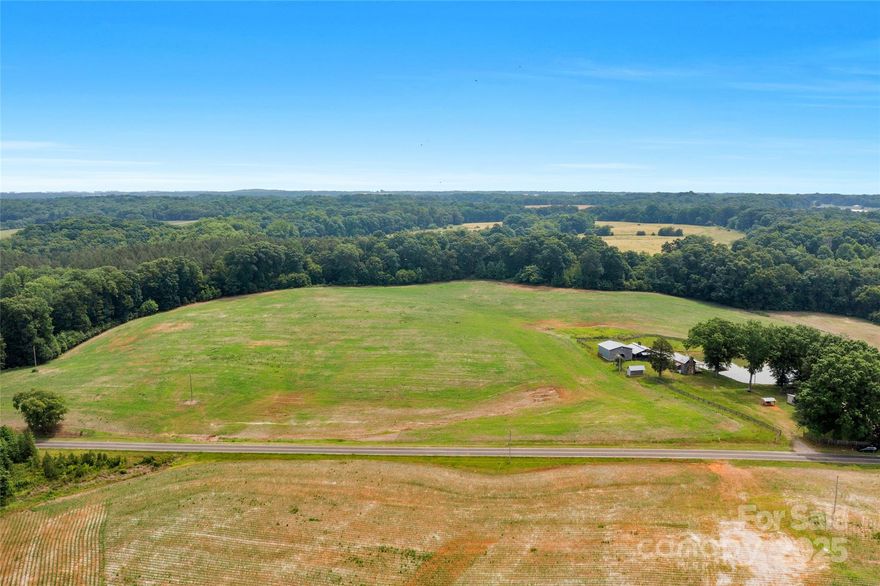 14.52 acres in the highly desired Countryside of Marshville, Union County! Private lot for your custom dream home and family farm. If you are interested in the country lifestyle, a large peaceful homesite, and long-range farm views, this is the land for you! Electrical utilities available on this lot. Easy access to Charlotte, New Salem, grocery stores, gas stations, other modern amenities. Right down the street from Eagle Chase Golf Club. Large open field and agriculture space surrounded by beautiful hardwoods and mixed timber to the back of the property. This picturesque landscape creates a private homestead and diverse habitat for wildlife. The gently rolling topography creates long range views and make land easy to manage.  The timber at the back is full of mature oaks and other hardwoods. With the large lot size, pursue building your dream home, use this land for your farm, equestrian activities, and other gardening activities. ** More land available for sale ** RA-40 zoning.