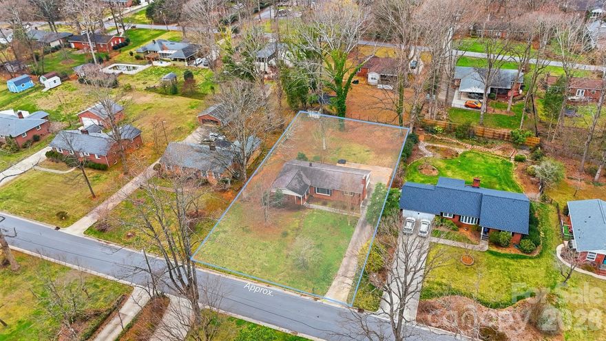 Spacious brick ranch in the heart of Conover! This 3BR/2BA home features original hardwood floors in the main living areas and LVP in wet areas. Updated kitchen with stainless steel appliances, butcher block countertops, tile backsplash, and ample cabinetry. Both bathrooms fully renovated with custom tile, stylish vanities, and shiplap accents. Enclosed back porch overlooks a large backyard—ideal for relaxing or entertaining. Convenient location within walking distance to shopping and dining, with easy access to I-40. Move-in ready!