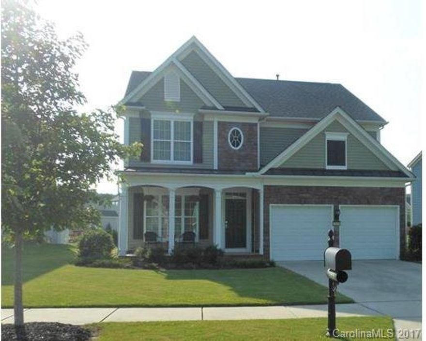 This gorgeous 4 BR, 2.5 bath home has gleaming hardwood flooring throughout the entire main level. The spacious upgraded kitchen includes stunning maple cabinetry, gorgeous counter tops, elegant tile backsplash, gas stove and stainless steel appliances also including refrigerator. Kitchen opens to a sun-filled great room with plenty of windows and gas log fire place. The additional dining room with wainscoting and the office with french doors provide ample living space