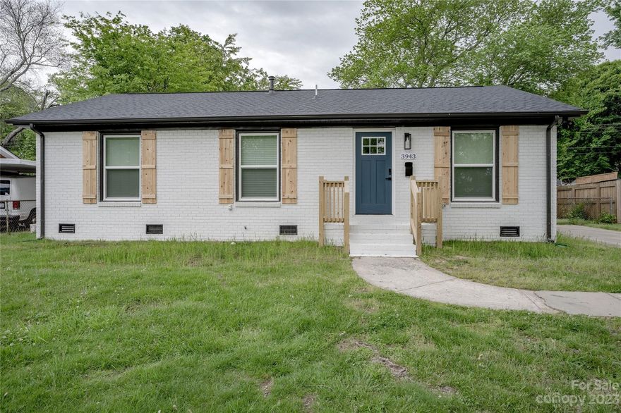 Welcome to this beautifully remodeled 3-bedroom, 2-bathroom home that exudes modern elegance and comfort. The open-concept living room seamlessly flows into the combined dining and kitchen area, creating the perfect space for entertaining. The kitchen boasts sleek stainless steel appliances, custom cabinetry, and stunning quartz countertops. A sliding door leads to a spacious rear deck, allowing for easy indoor-outdoor living and al fresco dining. The primary bedroom features a private bathroom with a glass shower adorned with stylish tile and a glamour mirror above the vanity sink. Step outside onto the rear deck, which overlooks the fenced-in backyard, with ample room for an outdoor seating area or a dining table. Additionally, the peace of mind is provided by the recently installed roof in 2022, ensuring a worry-free homeownership experience. Brokerage will not advertise this home for rent, ask you to wire money, or request funds through a payment app on your mobile device.