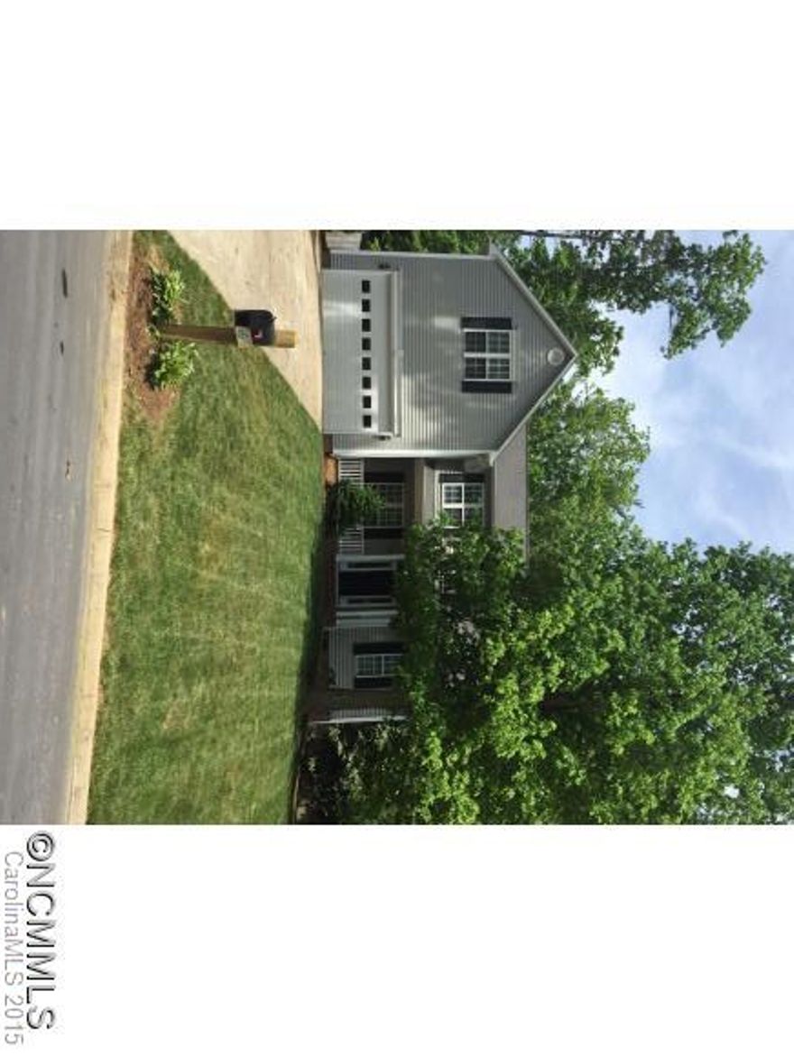 Totally redone, this home is ready to move into.  3/2 with great bonus room upstairs, Large Master suite on 1st floor.  Great room open to kitchen and breakfast room, formal dining.  All new paint, carpet and ceramic tile floors.  Two car attached garage, lovely yard with fully fenced back and deck.  Rocking Chair covered front porch.  Come See!