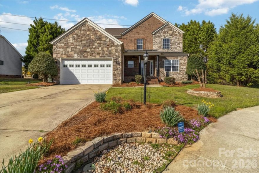 Nestled in Norwood Ridge, this beautifully appointed home is ready to welcome you! Spanning approximately 2,300 square feet, the thoughtfully designed layout offers 4 bedrooms and 2.5 bathrooms, providing plenty of room to live, grow, and entertain.

From the moment you step inside, rich hardwood floors, elegant crown molding, and plantation shutters set a tone of warmth and sophistication. Built-in bookshelves add character and charm, while a flexible main-level room (most recently used as a home office) adapts effortlessly to whatever your lifestyle calls for.

The kitchen is the heart of the home, boasting stainless steel appliances, generous cabinet space, a pantry, and a convenient built-in desk area perfect for homework, meal planning, or working from home.

Upstairs, retreat to your primary suite where a stunning tray ceiling and a custom walk-in closet system await. The ensuite bath feels like a personal spa, complete with dual sinks, a jetted soaking tub, a separate walk-in shower, and two linen closets. Three additional bedrooms and a spacious walk-in attic round out the upper level, offering all the storage you will ever need.

Step outside and enjoy a covered front porch perfect for morning coffee, while the back deck is made for gatherings, grilling, and golden-hour evenings with friends and family.

The community truly shines with a NEWLY RENOVATED POOL and playground, giving you a fantastic retreat just steps from home. The location could not be more convenient, with shopping, dining, and easy access to I-77 just minutes away.

This one checks all the boxes. Come see it for yourself!