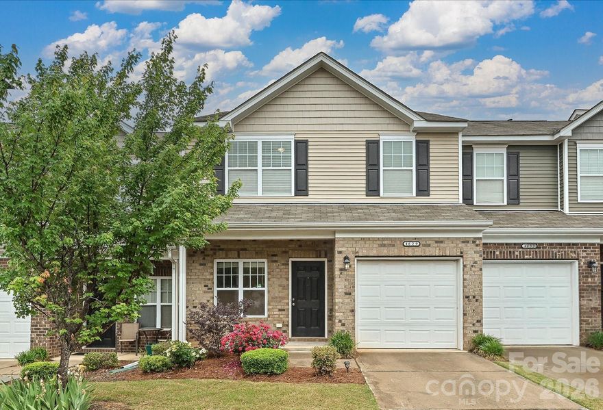 Located in a beautiful community just minutes from I-485 with easy access to I-77 and I-85, this well-maintained townhome offers a perfect blend of comfort and convenience. Featuring 2 BR, 2.5 bath, and a versatile loft, it provides an inviting and spacious layout. The main level showcases a large entryway, deep storage closet, and engineered hardwood floors throughout. SS appliances, granite countertops with bar, white cabinetry in the kitchen, and a bright breakfast area opens to the back patio and overlooks the great room. Upstairs features an open loft, a spacious primary suite with a walk-in closet and an attached study/office, a secondary bedroom, a full guest bath with soaking tub, and a laundry room.  HOA dues include lawn care, water and sewer, exterior maintenance, as well as access to the community clubhouse, fitness center, and outdoor pool. Refrigerator and washer/dryer convey. Enjoy the comfort, convenience and all the community amenities this home has to offer! Move-in ready and truly a must-see!!
