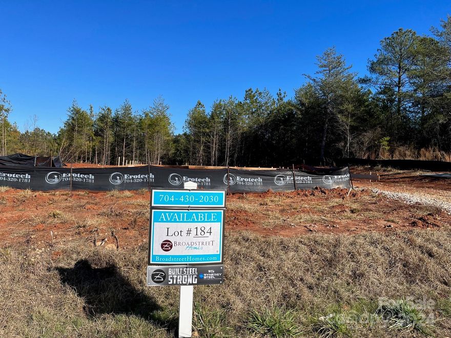 Live the vacation life year-round in Edgewater! Seller has graded and padded this homesite, saving the buyer approximately $20,000! Whether you're searching for a primary home or a weekend/seasonal getaway - you'll feel like you're always on vacation in this amenity-rich community! Fishing Creek Lake is nature's paradise for boating, fishing, bird & wildlife watching.  Edgewater offers residents walking trails, a beautiful waterfront pavilion, outdoor pool, and tennis as part of the HOA fee.  If golf is your game, or you have a boat to store, contact the Edgewater Golf Club/Marina for information on membership & fees - while not mandatory, these amenities are available to residents who wish to belong.  Note that a new build is subject to architectural review and approval, and adherence to square footage requirements.  Don't miss out on this lake community - easily commute to Columbia or Charlotte!  Seller will entertain bulk lot purchase with lot 46 in the community.