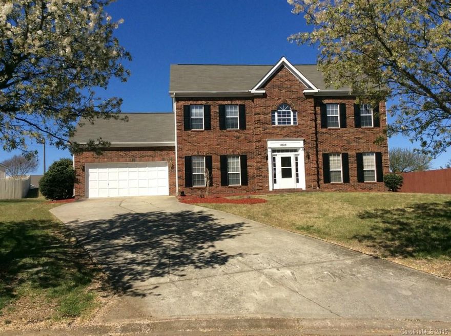 Welcome home! This 4 BDRM 2.5 BTH home features Elegant entrance w/storm door & transom windows. The frml living rm has crown molding, & fireplace. The frml dining has crown & wainscoting moldings. The chef style kitchen features wood flooring, island, desk area, ceiling fan, microwave, breakfast area, & pantry. Relax in the fmly rm w/ceiling fan & wet bar. The master has w/tray ceiling & walk-in closet.The bath has garden tub, dual sink vanity,& walk-in shower. The secondary bdrms are spacious.