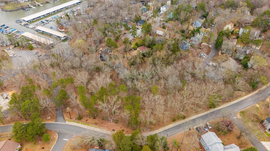 Approximately 2.76 acres conveniently located on Tega Cay Dr and Marina Dr offering a great opportunity to build your own home, subdivide it or explore the option to rezone it to commercial. Be a part of the Tega Cay community featuring Fort Mill Schools, Tega Cay Golf course and clubhouse, Lake Wylie, sports fields, playground and sidewalks. Close to Baxter, Kingsley, Downtown Fort Mill and many restaurants and breweries. The property is located in the Marina District Overlay District.