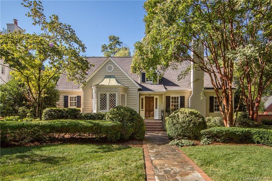 This charming cottage is much more than meets the eye.  Large foyer and formals lead to an open family room, breakfast area and kitchen.  Handsomely renovated with all the modern amenities such as laundry room with custom cabinetry, mudroom, office nook and butler's pantry.  Expansive half acre level lot with incredible privacy backs up to Winghaven Gardens. Master suite with marble bath on the main level. All additional bedrooms on the upper level have attached bathrooms. High ceilings.