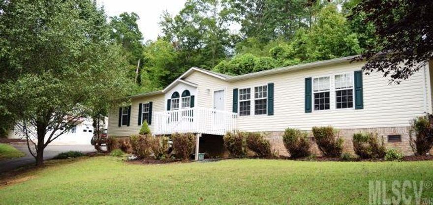 Great value for this home that is nestled on over 1.3+/- Acres near Lake Rhodhiss! Completely updated 3Br/2BA home. New tiger-wood floors throughout the living areas. Large den with wood burning fireplace, open kitchen w/ stainless steel appliances. Master suite with a large walk in closet, spacious master bath with dbl sinks, sep. tub/shower. Over 600 sq ft of covered concrete patio space, outbuilding with power. Detached double garage with plenty of storage. Perfect house for entertaining. Priced to sell!