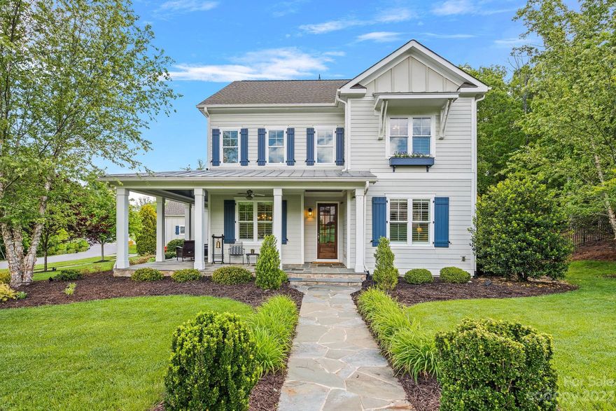 Custom farmhouse in highly sought after Woodlands at Davidson. This home has it all-beautiful hardwoods, custom molding, wrap-around porch and a private backyard paradise. The chef's kitchen has a large island, gas cooktop, and plenty of counter/cabinet space. Enjoy meals in either the breakfast room overlooking a natural area or in the formal dining room adorned with wainscoting. Entertain in the great room with a stone fireplace, the oversized screened-in porch, or the pool/spa area. The main floor primary suite has vaulted ceilings and an ensuite bath with double sinks, tower storage, and large tub perfect for relaxing. The second floor boasts 3 large bedrooms all with walk-in closets, 2 fully renovated baths, and a bonus area. Park in the 3-car garage and then drop your coats at the double drop zone or large mud room with washer/dryer, sink, and storage galore. Large walk-up storage over the garage (which can be finished) rounds out this home. Book a showing before it is too late!