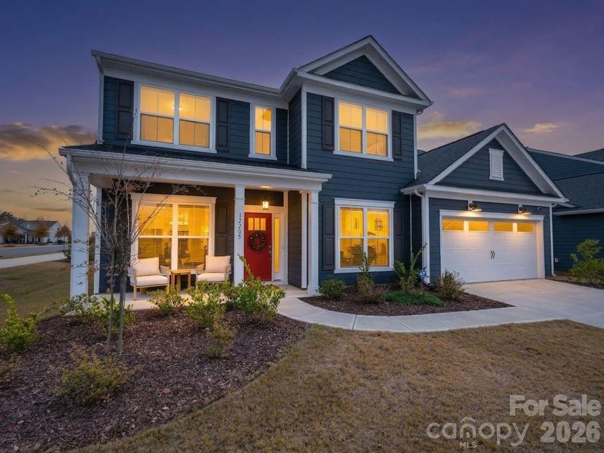 Better than new, this stunning 2023-built home welcomes you with thoughtful upgrades already in place. As you step inside 12205 Hollinhope Drive, the foyer sets the tone with rich engineered hardwoods and elegant wainscoting, creating an inviting, elevated feel. To one side, a quiet front office offers a dedicated space for work or study; to the other, a spacious dining room connects seamlessly to a well-appointed butler’s pantry leading into the heart of the home.
The kitchen, breakfast area, and living room unfold in a bright, open layout designed for gathering. A large island with custom pendant lighting, quartz countertops, upgraded cabinetry with roll-outs, a gas range with vented hood, and a walk-in pantry make the kitchen both beautiful and highly functional. The living area features a gas fireplace with floor-to-ceiling tile surround, while a sunroom just beyond opens to the back patio and level corner lot—ideal for morning coffee or relaxed afternoons.
A privately tucked main-level ensuite bedroom offers flexibility for guests or multigenerational living. Upstairs, a spacious loft serves as a central retreat. The primary suite impresses with tray ceiling detail, abundant natural light, and a spa-like bath with dual vanities, a soaking tub, oversized tiled shower, and a large walk-in closet. Three additional bedrooms each include walk-in closets, with one offering its own ensuite for added comfort.
Located in a growing community with a clubhouse, pool, sidewalks, playground, and dog park, and just minutes from shopping, dining, Lake Wylie, and the airport. HOA includes high-speed internet and TV. A rare opportunity to enjoy a model-like floor plan, upgrades, and space—without the wait.