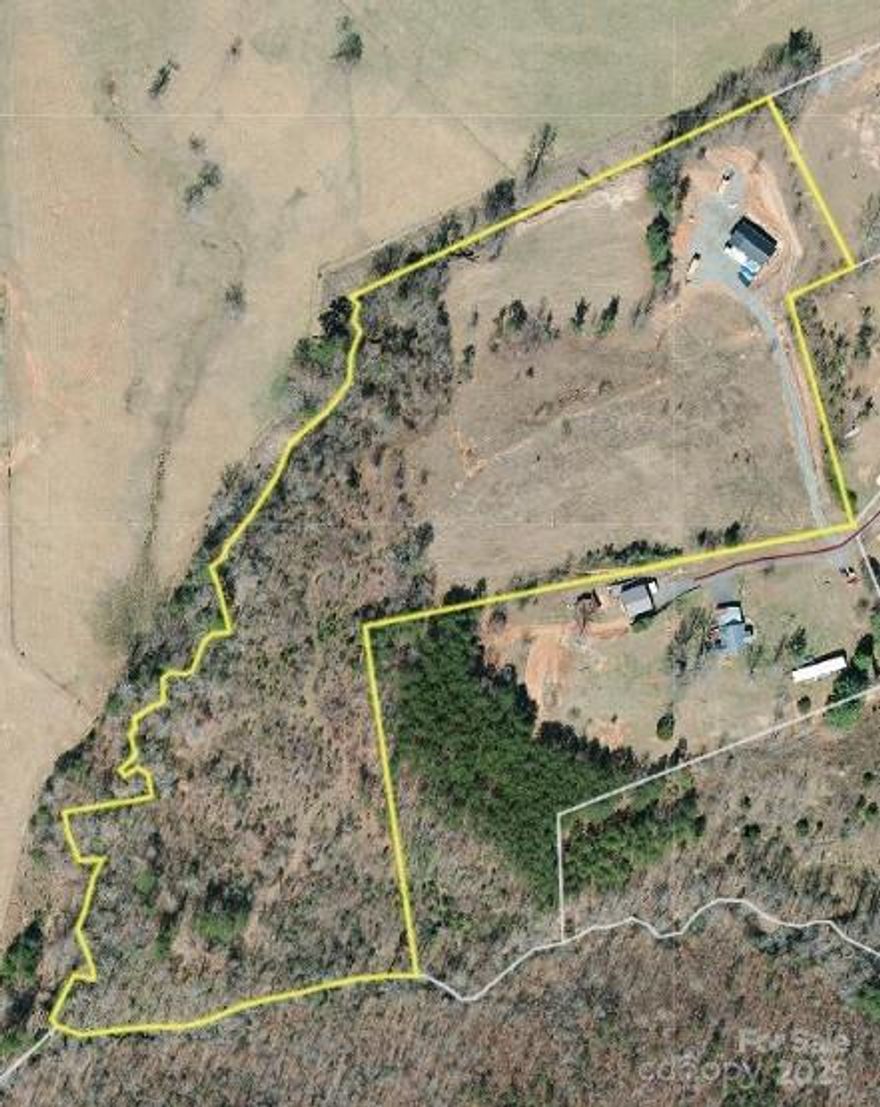 Entered as Comp Only -- This property was sold off market and featured a fully finished "Man Cave" structure with power, water, heating/cooling, full bathroom and kitchenette. The property also featured a large carport, creek frontage and long range mountain views. There was a second 3 bedroom septic permit on file with the county at the time of the contract.