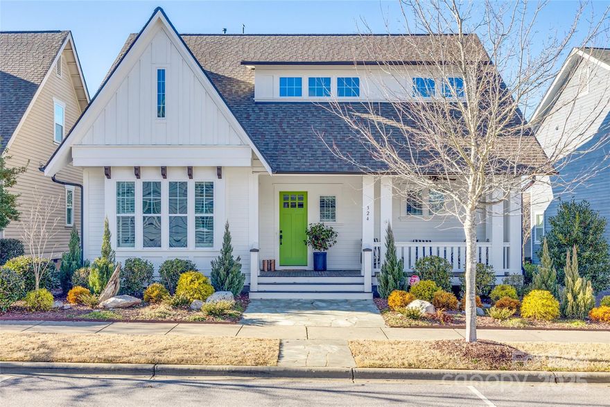 Welcome to this amazing Saussy Burbank home in Riverwalk. The open concept living space is great for entertaining & is loaded with upgrades galore including custom built-ins in the living room & upstairs hallway, shiplap throughout, gorgeous light fixtures, marble tile gas fireplace, walkout attic storage. The kitchen showcases top-of-the line white cabinetry, oversized Carrara marble island & quartz on the perimeter counters, white tile backsplash, & SS appliances. Owner's suite on main includes soaking tub, walk in shower, & marble tile floors. Two of the bedrooms upstairs include private bathrooms with tile tub surrounds & flooring.  The 4th bedroom/flex features beautiful barn doors. Plantation shutters & site-finished hardwood floors on main floor, 10’ ceilings with 8’ doors downstairs and 9’ ceilings upstairs & security system. Backyard features screened in porch, patio, wood privacy fence, 2.5 car garage, & adjacent parking pad.