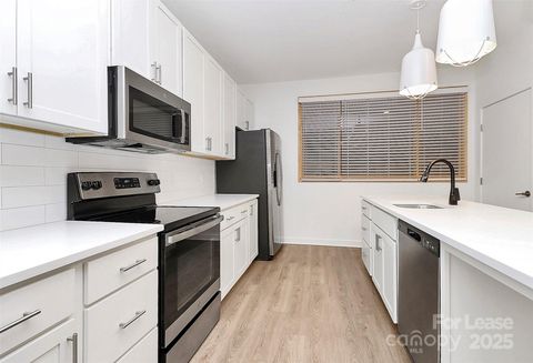 Photo of 1115 Seigle Avenue #104, Charlotte, NC 28205 (MLS # 4329455)