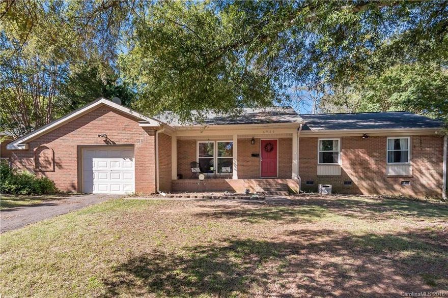 Spacious all brick home on a huge corner lot with great curb appeal.  Home has replacement windows. Nice, open kitchen with upgraded oak kitchen cabinets and lots of counter space.  Covered patio out back.  Large fenced in back yard with entertainment space.  Dual driveways, one on Woodstream  and one on Oakstone. Storage building conveys.  Great location, close to the light rail, Uptown & Southpark.