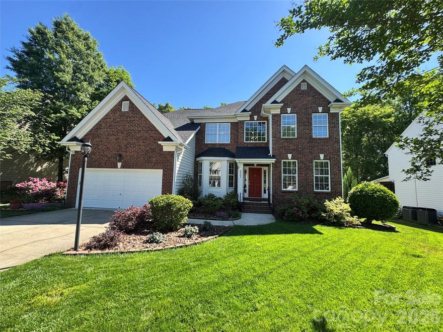 Welcome to life in Olde Sycamore, a community known for its warm, inviting atmosphere and vibrant lifestyle. From neighborhood social gatherings to festive holiday decorating contests, this is a place where neighbors truly connect. Residents enjoy exceptional amenities including a resort-style pool with patio grills, community center, tennis and pickleball courts—all while feeling tucked away in a peaceful, country-like setting just minutes from I-485 for easy access to everything Charlotte has to offer.

Inside, this beautifully maintained home immediately impresses with hardwood floors throughout the main level and a layout designed for both everyday living and effortless entertaining.

The updated kitchen (2023) is a true centerpiece, featuring granite countertops, subway tile backsplash, deep stainless steel sink, new faucet, garbage disposal, and stainless dishwasher, along with double ovens, a large island, and an expansive walk-in pantry—offering both function and style in abundance.

Step outside to the Trex deck, where you’ll enjoy the perfect balance of morning sunshine and cool evening shade, all overlooking a manicured, fully fenced backyard that backs directly to the Olde Sycamore Golf Course—creating a private and scenic outdoor retreat.

Upstairs, the spacious primary suite provides a true escape, complete with his and hers closets plus an oversized storage closet, while secondary bedrooms offer flexibility for family or guests. A large bonus room adds even more versatility—ideal for a media room, playroom, or home office. Throughout the home, you’ll find an abundance of storage, thoughtfully integrated to keep everything organized and out of sight.

This home is also loaded with valuable system upgrades, including a new roof (2022), HVAC systems replaced in 2022 and 2024, and the new deck—allowing you to move in with confidence and peace of mind. Additional features include a whole-yard irrigation system and architectural landscape lighting, with the sprinkler controller and backflow valve replaced in 2024.

This is more than just a home—it’s a lifestyle, combining comfort, community, and convenience in one of Mint Hill’s most sought-after neighborhoods.