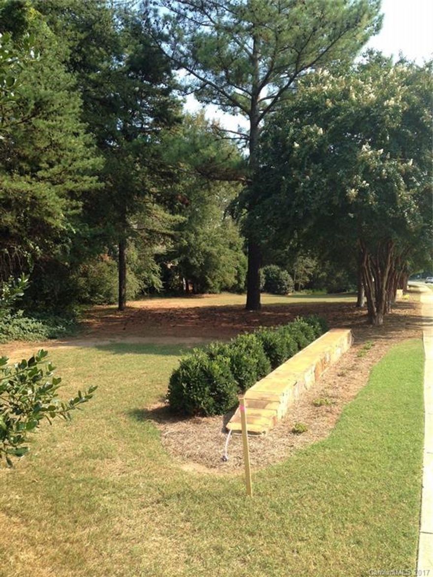 One of the last building lots in the Peninsula. 80% build area/huge impervious just updated in Feb '17. Level lot with possible pool potential. Driveway access from either road. Excellent location just across the street from golf course/view and water view from the second floor possible. Beach access and a deeded boat slip which is located just down the road, less than half a mile. (Currently one boat slip available for sale and one for rent) Yacht Club and/or Country Club memberships available.