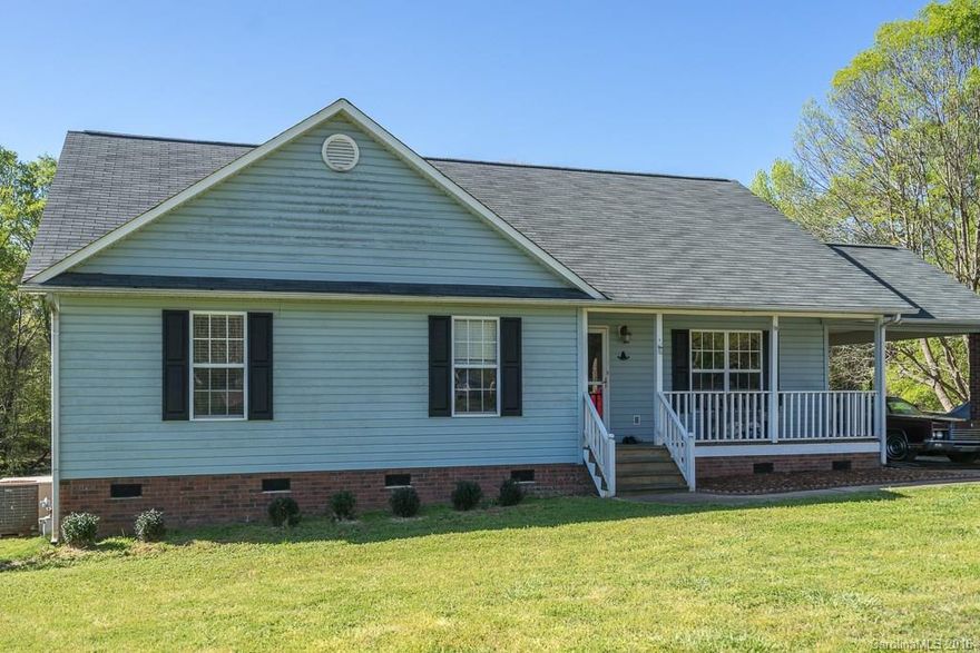 Country Ranch Style Home on 1.4 acre lot.  Den is wired for surround sound.  Kitchen appliance and flooring are 5 years old.  Roof is 3 years old.  Attic with pull down stairs & lots of storage.  Fenced in back yard with 2 story storage/work building wired for electricity, security & fans.  Refrigerator, washer, dryer, and riding lawn mower to remain with home.  Located close to I-77, Shopping Mall and restaurants. One year home warranty provided by seller!