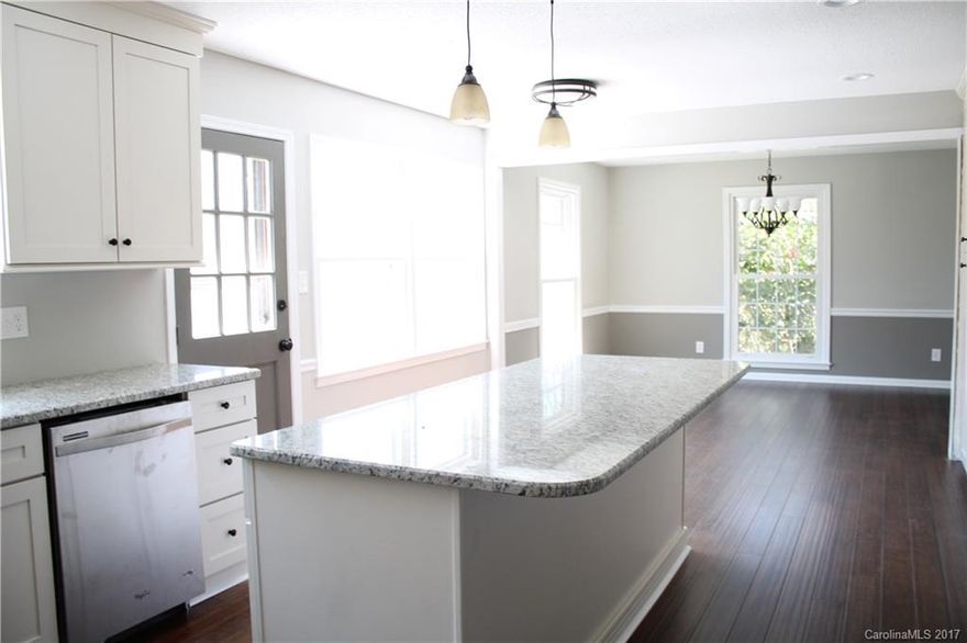 Gorgeous totally renovated Shiland Hills home! Stunning kitchen with huge island. New flooring throughout. *Buyer can choose their own carpet to be put in upstairs. Freshly painted throughout. Walk out unfinished basement is the perfect space for a home gym or shop.