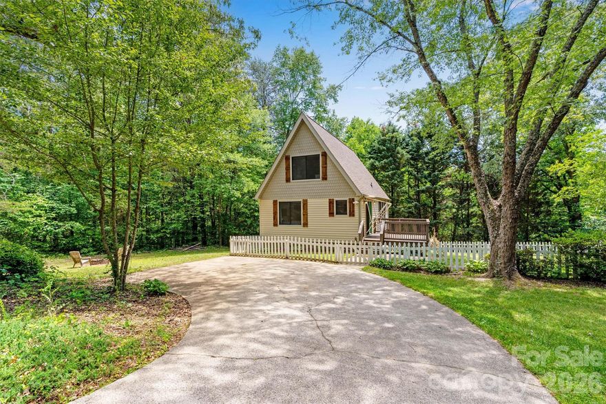 Discover the perfect blend of cottage charm and peaceful living at 8347 Cedar Circle.  Now offered with an additional 0.81-acre adjoining wooded parcel for added privacy and potential totaling 1.04 acres with both parcels. Nestled on a quaint, cul-de-sac, this well-maintained 2-bedroom, 1-bath A-frame invites you to slow down and enjoy a lifestyle surrounded by nature.

Inside, the beautiful two-story family room creates an inviting focal point filled with warmth and character, while the light-filled four seasons room offers a tranquil retreat, ideal for morning coffee, reading, or simply taking in the sights and sounds of the outdoors. The adjacent galley kitchen with a cozy dining nook, provides easy functionality, allowing for effortless everyday living and casual entertaining. 

The main level features a comfortable primary bedroom, full bath, and convenient laundry area, offering true one-level living. Upstairs offers a versatile second bedroom loft that overlooks the living space below and can easily serve as a guest retreat, home office, or creative flex space.

Step outside and enjoy a park-like setting complete with a fenced yard, spacious deck, retractable awning, and built-in bench seating—perfect for relaxing or hosting gatherings. A walk-in crawl space provides excellent storage a with room for a small workshop.

Whether you're searching for your first home, a downsizing opportunity, or a weekend escape, this charming A-frame, enhanced with an additional parcel offers a delightful combination of comfort, character, and natural beauty. 

Schedule your private tour today!