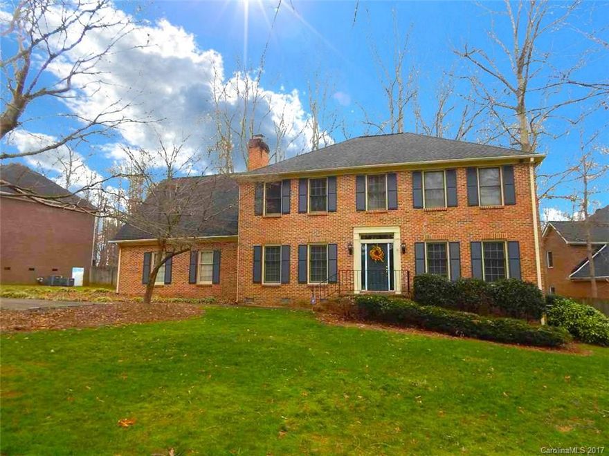 Come see this beautiful, all brick home located in popular Oakhurst subdivision!  4 bed/ 2.5 bath with 2 car attached side load garage on just under half an acre with private back yard and mature trees.  Home has formal spaces, hardwoods, stainless appliances, fireplace, and many more great features.