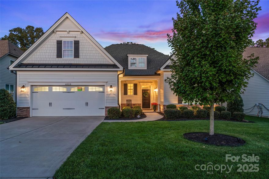 This immaculate ranch by Toll Brothers is ready for you to call home! Step inside from the welcoming front porch to find a grand entry hall that leads you to the stylish gourmet kitchen featuring quartz counters, large center island, 5-burner gas cooktop, ample cabinetry & generous size walk-in pantry. The kitchen flows effortlessly into the family room, where cozy gatherings await under a beautiful tray ceiling, gas fireplace & plenty of windows showcasing the views of your wooded backyard. The spacious primary suite features a walk-in closet with valet table & luxury bath with oversized tiled shower. The guest suite offers privacy with dedicated bath & the study features french doors & built-ins— offering flexibility as either a workspace or inviting 3rd bedroom. Enjoying the outdoors is easy from the screened porch with added deck that overlooks the wooded back yard. Additional features include hardwoods throughout main areas, plantation shutters, & oversized garage.