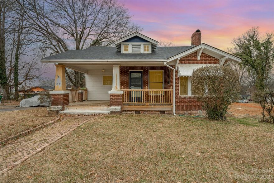 Charming all brick ranch ready for your personal touches!! This all brick ranch features a large front porch perfect for enjoying the Carolina weather. Inside you will find a large living room open to the dining area and kitchen. Main areas are light and bright with neutral paint and large windows. 2 large bedrooms share a full bath. In the back of the home you will find your primary suite with en-suite and private exterior exit. Unfinished basement gives you a great place for storage. This home with solid bones is great for the investor or homeowner looking to put their personal touches on a home. Conveniently located to shopping, dining and a quick drive to Uptown and I-77.