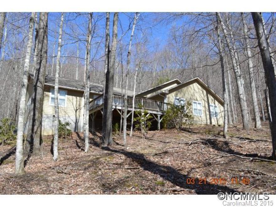 Very well maintained home in Villages of Plott Creek that was only used in the summer. Ample space, open floor plan, large deck, 2 car garage on main level, Office, Library/Bonus Room, situated on a private lot.