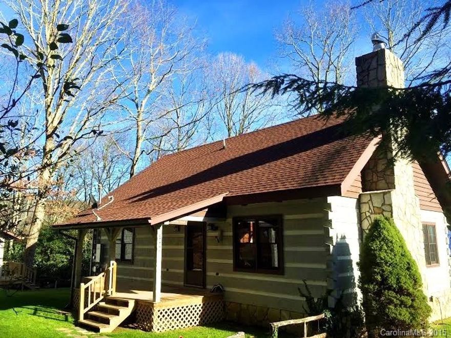 AMAZING you can't believe it VIEWS! WOW! Beautiful hand hewn square logs in & out. Spacious Master w/ sitting area. Roomy loft. Beautiful stone WB fireplace. Wonderful wood ceiling. Dining room has views too! Roomy back porch for relaxing, enjoying the view or for entertaining. Upstairs loft for add'l entertainment space, sleep or office. Det. Garage/Work Shop. Awesome cabin feels private, away from it all.....close to town & more! Your Mountain Getaway (or FT Residence) is waiting for you!