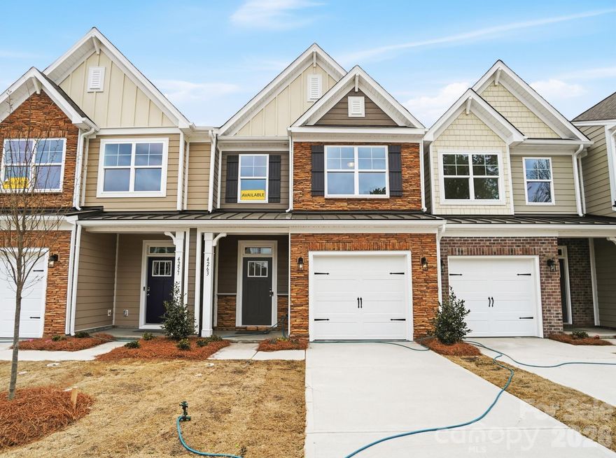 New townhomes in Harrisburg! This home has 3 bedrooms, 2.5 baths, and more than 1,700 square feet of living space. The light and bright kitchen features white cabinets, quartz countertops, and tile backsplash, along with stainless appliances including a gas range. All baths feature white cabinetry and white quartz counters as well. The primary suite, located on the upper floor, includes a large walk-in closet, and the primary bath features a tiled shower and dual-sink vanity. The upper floor also features two additional bedrooms, a full bath, and the laundry closet. Additional features include stairs with composite treads and metal balusters, foyer with large closet, Enhanced Vinyl Plank (EVP) flooring, and beautiful wall trim. Community amenities include outdoor pool & cabana, dog park, paved walking trail, and playground.