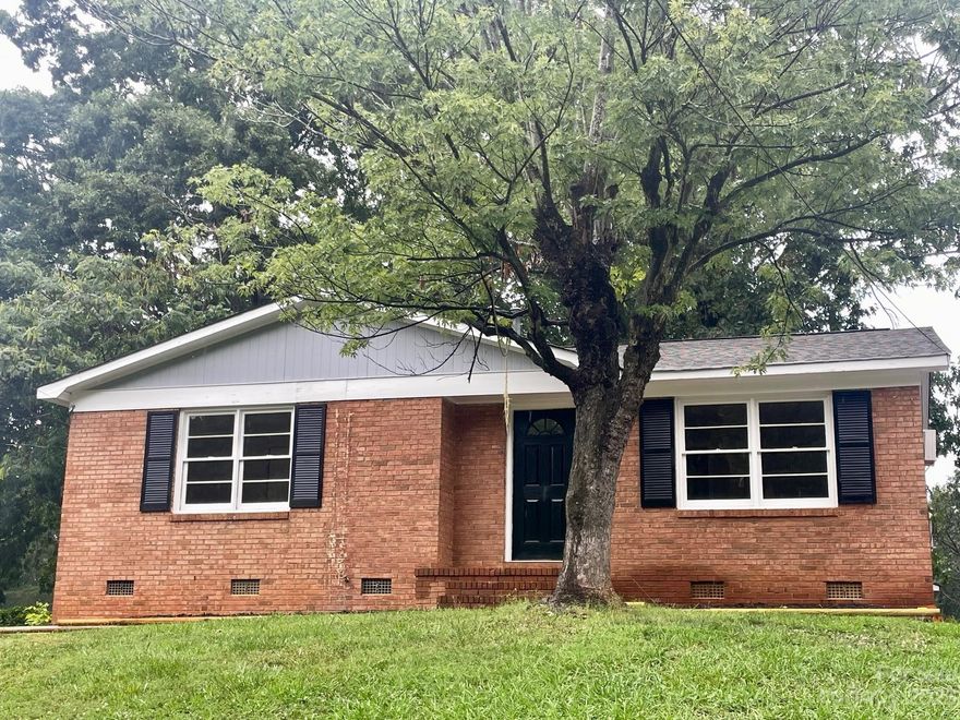 MAJOR PRICE REDUCTION!  Seller needs this rental off his books.  Whether adding this to your Rental Property Portfolio or calling it home, this brick home on deep lot is worth a look.  A detached large garage/workshop in the back is great for any Buyer wishing to work on cars, boats or act as a workshop.  Conveniently located near Yorkmount, with 15 min access to the airport and Southpark Mall.  Well appointed room size makes this home worth consideration and hard to find under $300k.  Seller to install appliances upon contract.