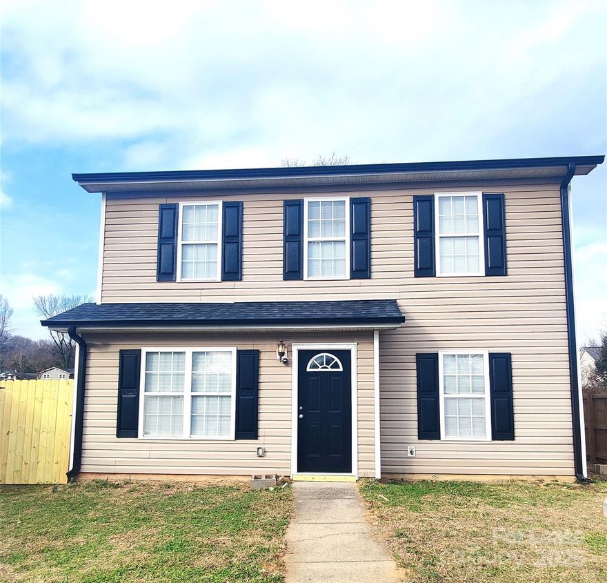 Charming 2 story home with 4 bedrooms in convenient West Charlotte area! Home has easy to clean and pretty LVP floors throughout. Primary bedroom on first floor has access to full bathroom with garden tub/shower combo. Kitchen has stainless steel appliances. Family room has big windows for lots of light! Second floor has 3 bedrooms, full bathroom with shower/tub combo, and huge laundry room. Front yard is fully fenced in. Back yard has privacy fencing on two sides. Lots of parking available, accessed by alleyway behind home.  Note - no parking/front door access on West Blvd.  Alleyway is on left at Elmin St/West Blvd intersection, running parallel to West Blvd.
