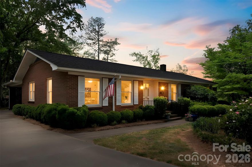 Located in the heart of Cherryville, this stately brick home seamlessly blends timeless charm with thoughtful updates, all nestled in a quiet, well-established neighborhood. Featuring 3 bedrooms, 2.5 bathrooms, and a finished basement, this home offers ample space for living, working, and entertaining. The main level boasts both a formal living room and a cozy family room with gas logs, creating the perfect balance of elegance and comfort. The formal dining room is a true showstopper, highlighted by beautiful wallpaper and a statement chandelier—perfectly embodying the sought-after grand millennial style. The kitchen is equipped with stainless steel appliances and opens to a charming breakfast area with built-in seating, ideal for casual mornings or gathering with family. The primary suite features an updated bathroom, while two additional bedrooms share a convenient Jack-and-Jill layout. Crown molding throughout portions of the main living areas adds an extra layer of sophistication. The finished basement adds valuable flex space and includes a convenient half bath, enhancing functionality for guests or entertaining. Step outside to enjoy the covered patio and terrace just off the family room, perfect for entertaining or relaxing evenings at home. Recent updates, including a new roof, gutters, and gutter guards in 2025, provide added peace of mind. A home full of character, space, and modern updates, all in a desirable Cherryville location.