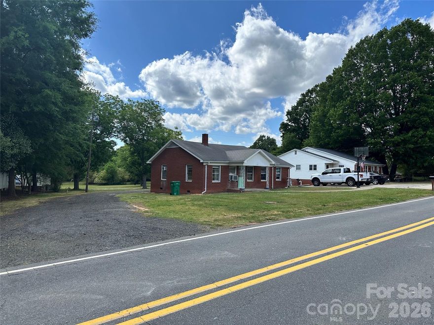 Great location in the city of Locust close to Intersection of Hwy 24/27 and Meadow Creek Church Rd. Property has tenants in place please do not disturb. Property includes house and duplex which have tenants in place on verbal month to month lease. Value is based on acreage and future development potential. This property adjoins other listed parcels that have frontage on Main Highway. Development possibility to be confirmed with Locust Planning and Zoning by buyers agent. Property being sold as is, seller to make no repairs or improvements.