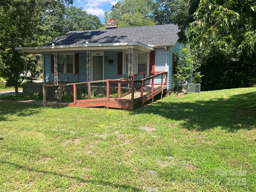 Large corner lot in Residential Office (R-O zoning). The property is IDEAL for 203K program.  Spacious rooms, some with hardwood floors. New roof installed April 2025. PRIME location for you to start your new business or possibility for rental property.