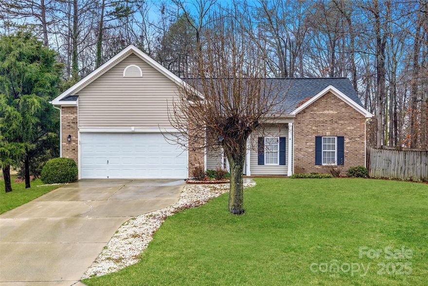 Charming ranch-style home nestled on a cul-de-sac street. This well-designed home features a desirable split-bedroom layout, offering privacy and comfort. The open floor plan seamlessly connects the living spaces, highlighted by wide plank flooring in the living room and breakfast area. Enjoy the tranquility of a tree-lined backyard and relax on the inviting covered front porch. Conveniently move-in ready, with the washer, dryer, and refrigerator included. For added security, the seller is offering a $550 home warranty with an accepted offer. Plus, no HOA fees to worry about. Don’t miss this gem!