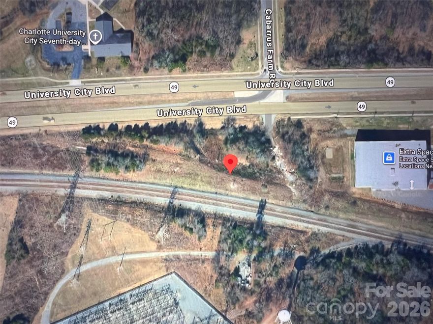 +\- 2.20 Acres Located at 11520 University City Boulevard, Charlotte, NC 28213. Current Zoning is ML-1. Per City of Charlotte and Mecklenburg County: The ML-1 Manufacturing and Logistics Zoning District is intended to accommodate a range of warehouse/distribution and light industrial uses, including a variety of light manufacturing and assembly. The ML-1 Zoning District includes significant screening and buffering requirements to ensure adequate separation and mitigation of potential impacts on surrounding areas. Limited restaurant, retail, and personal service uses to accommodate area workers are also allowed in the zoning district. The ML-1 Zoning District is generally located in areas readily accessible by arterials and interstates, as well as freight rail.