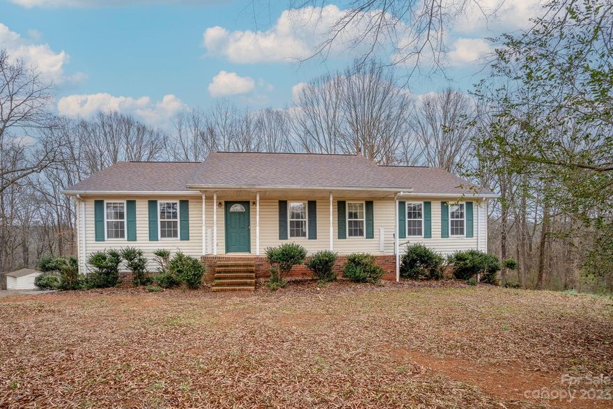 Situated down a private gravel rd and boarding the large Bear Creek, adventure is in your back yard. Offering 5  quiet acres outside of town this home gives you the peaceful escape you've been looking for. Conveniently located half way between Albemarle and Oakboro and less than one hour from Charlotte.
 This house boast a spacious split floor plan with a full unfinished basement giving you ample storage or even the potential of extra living space. A great home for a growing family. Come and take a look yourself!