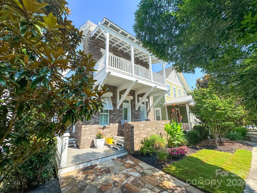 Welcome to Riverwalk in Rock Hill, SC. Built by Saussy Burbank, this gorgeous home backs to mature trees for added privacy and is filled with luxe features and designer touches. Upon entry you’re greeted with both Serena & Lily and Thibaut Grass Cloth Paper wall coverings, new lighting fixtures, plantation shutters and hardwoods throughout entire home. Kitchen renovation; Monogram appliances including 4-burner range w/ air fryer and griddle, hood w/ custom cover, built-in microwave added to new island w/ waterfall quartz, farm sink and backsplash. New Moen plumbing fixtures throughout, Brizio fixtures in owners suite tub and shower. Moen bathroom sinks and quartz countertops, new ceramic tile in laundry room with recently added cabinetry. Both interior and exterior of home freshly painted, epoxy floor in garage and sod in front and backyard. Riverwalk resides alongside the Catawba River. Shopping, dining, walking trails and an innovative, world-class cycling velodrome.